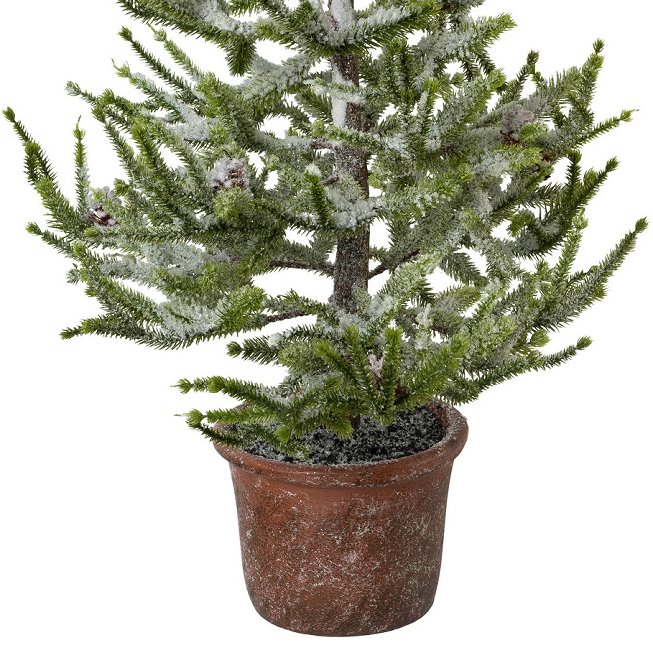 Artificial plant spruce with snow