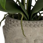 Orchid bamboo arrangement in buddha pot