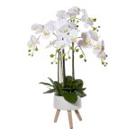 Artificial plant orchids in ceramic bowl