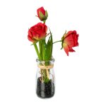 Artificial flower roses in glass vase