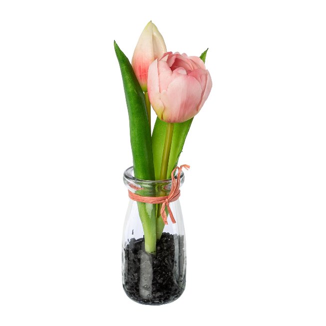 Artificial flower tulips in glass vase